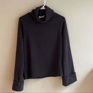Black turtle neck sweater